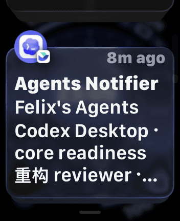 Apple Watch showing a compact coding-agent completion notification delivered through Lark.